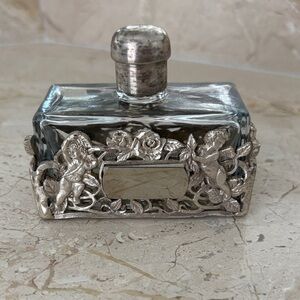 vintage glass perfume bottle with  metal overlay